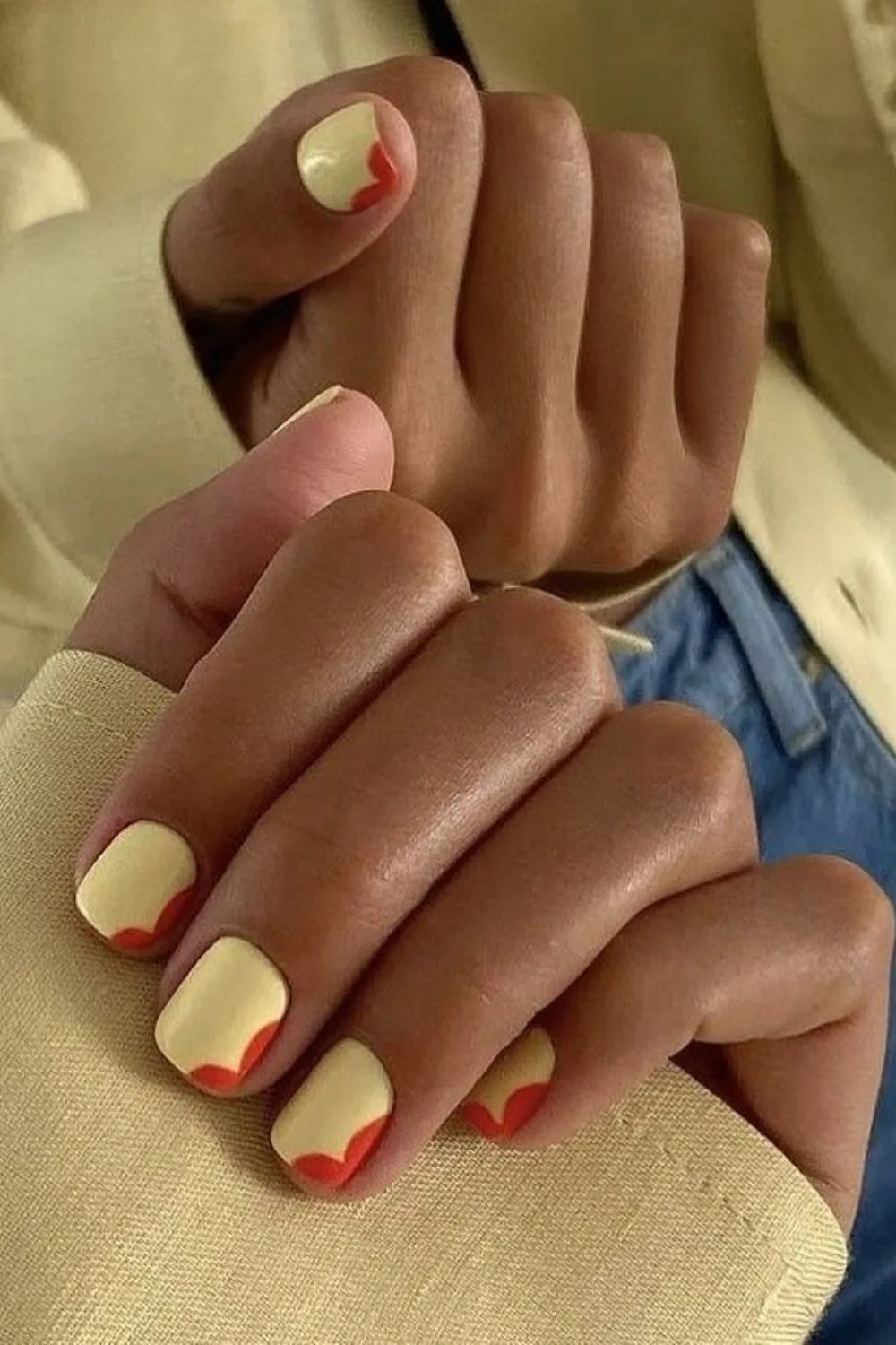 yellow short nails with red details