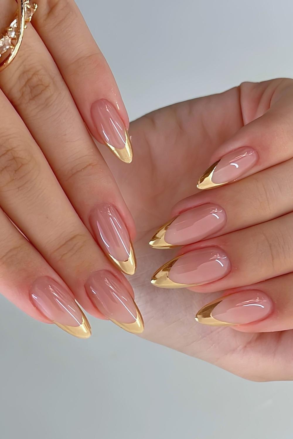 Almond shaped gold french manicure