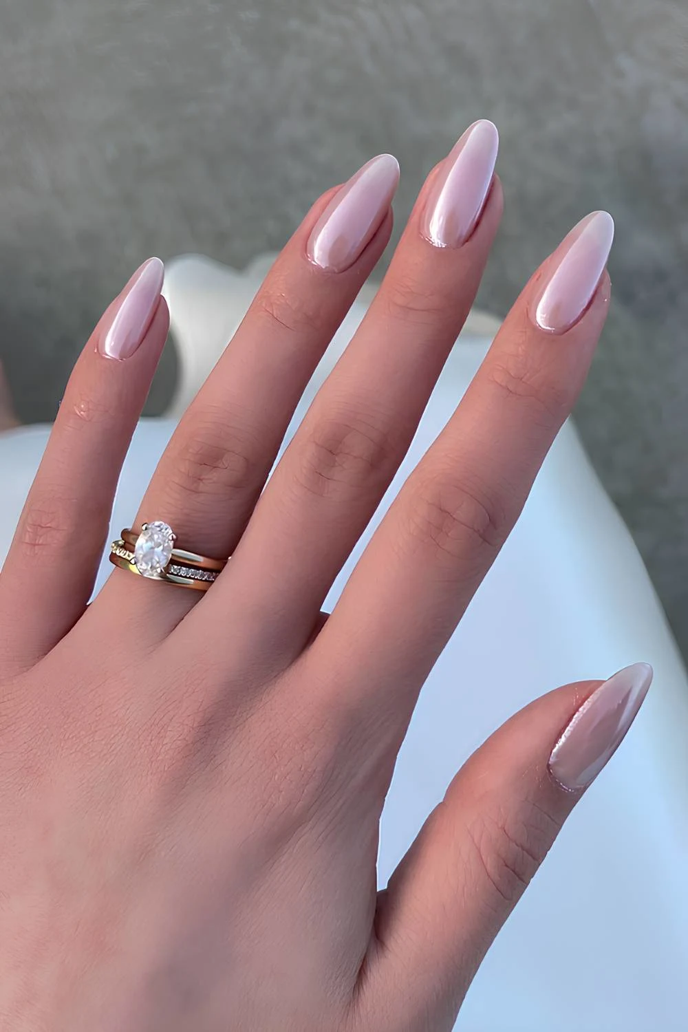 Almond shaped neutral chrome manicure