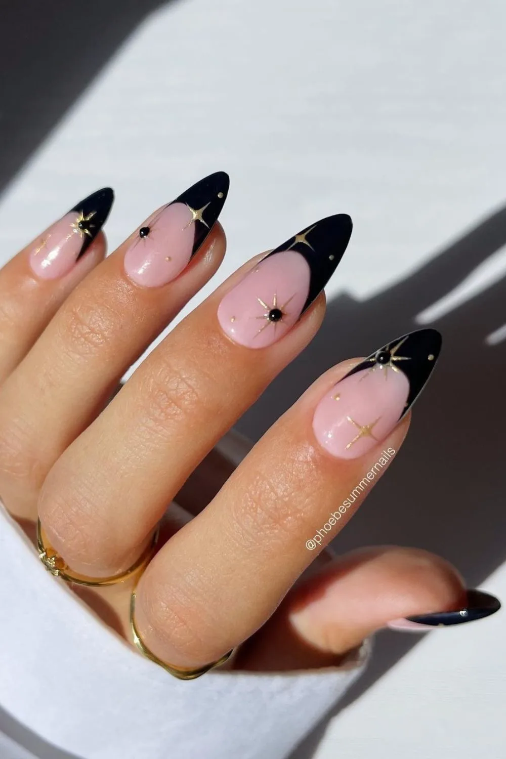 Black nails with star accents