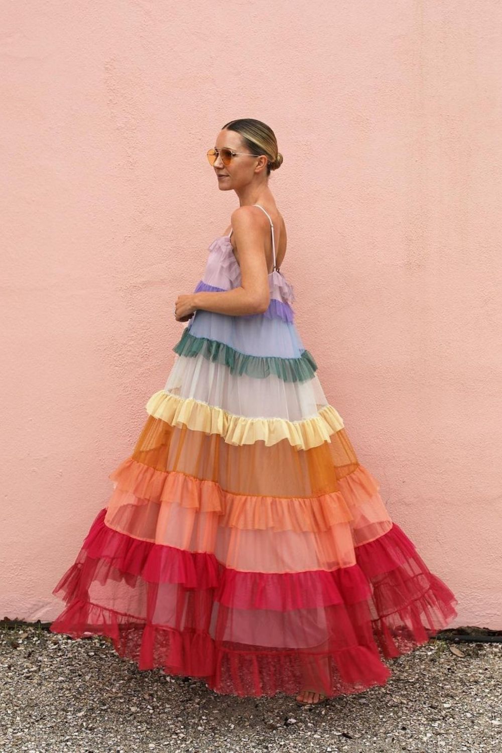 Blair wearing ruffle colorful dress