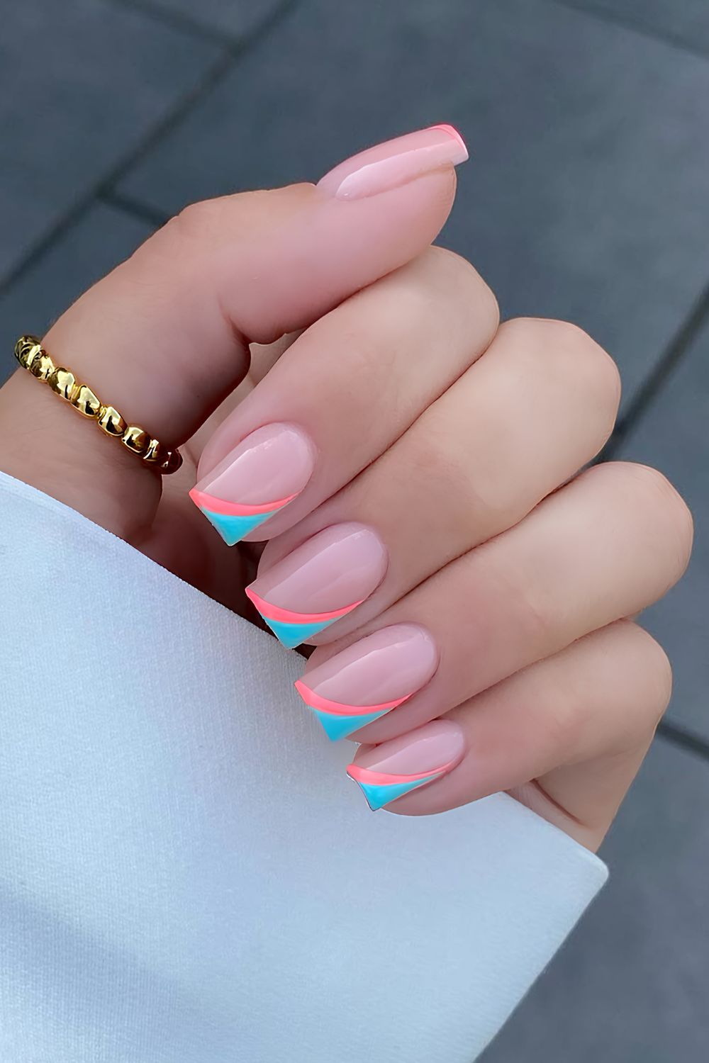 Blue and coral side French tip nails