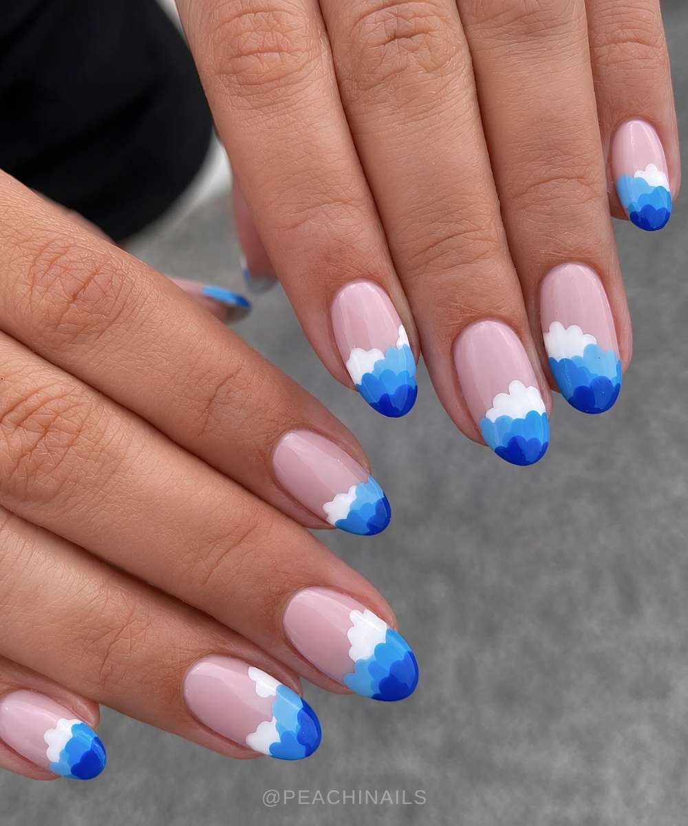 Blue and white cloud themed nails