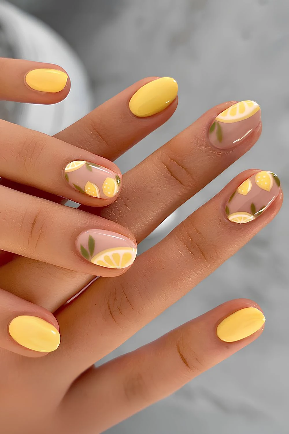 Bright yellow mani with lemon slice art