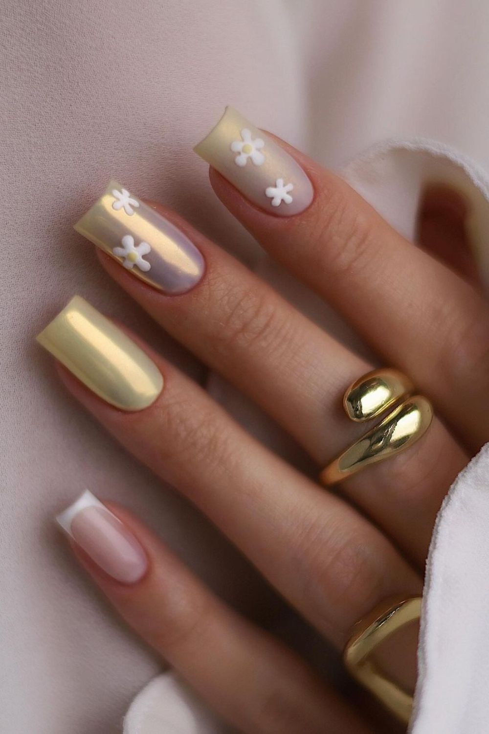 Butter yellow chrome nails