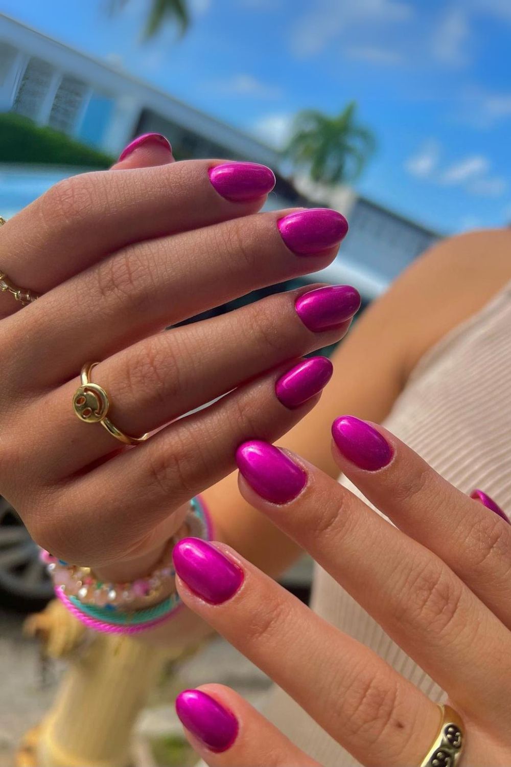 Deep pink chrome nails