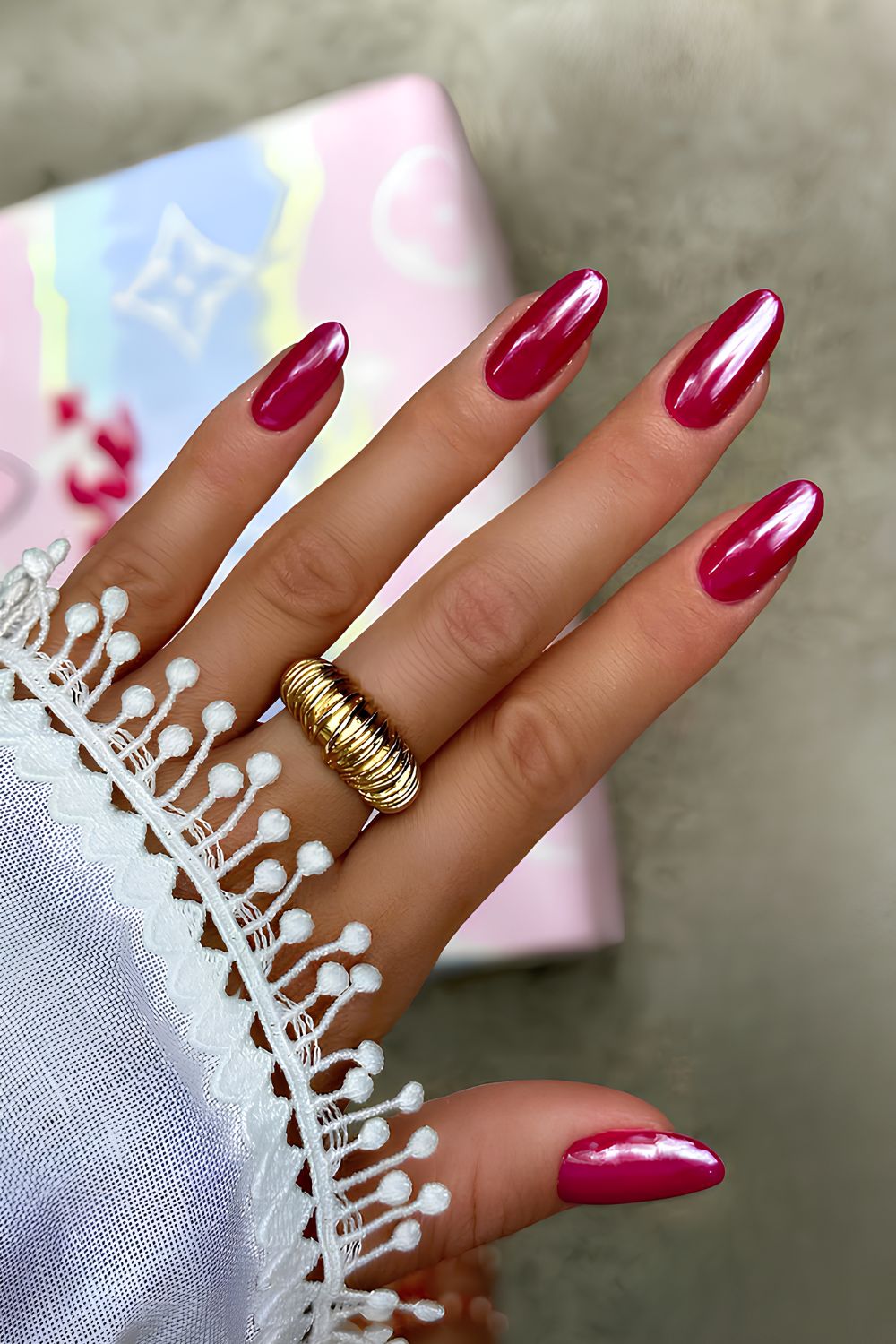 Deep pink chrome nails