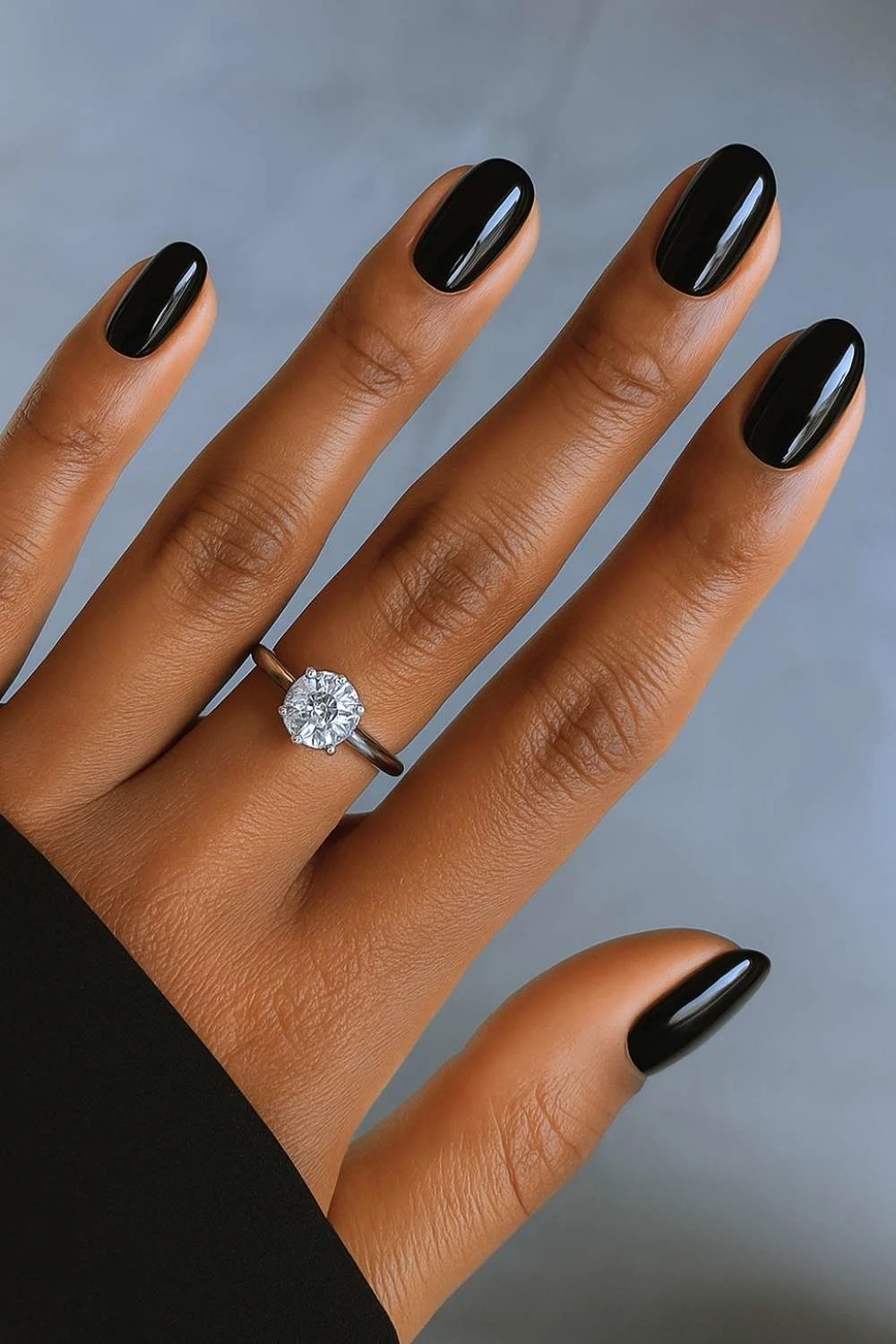 Elegant oval black manicure