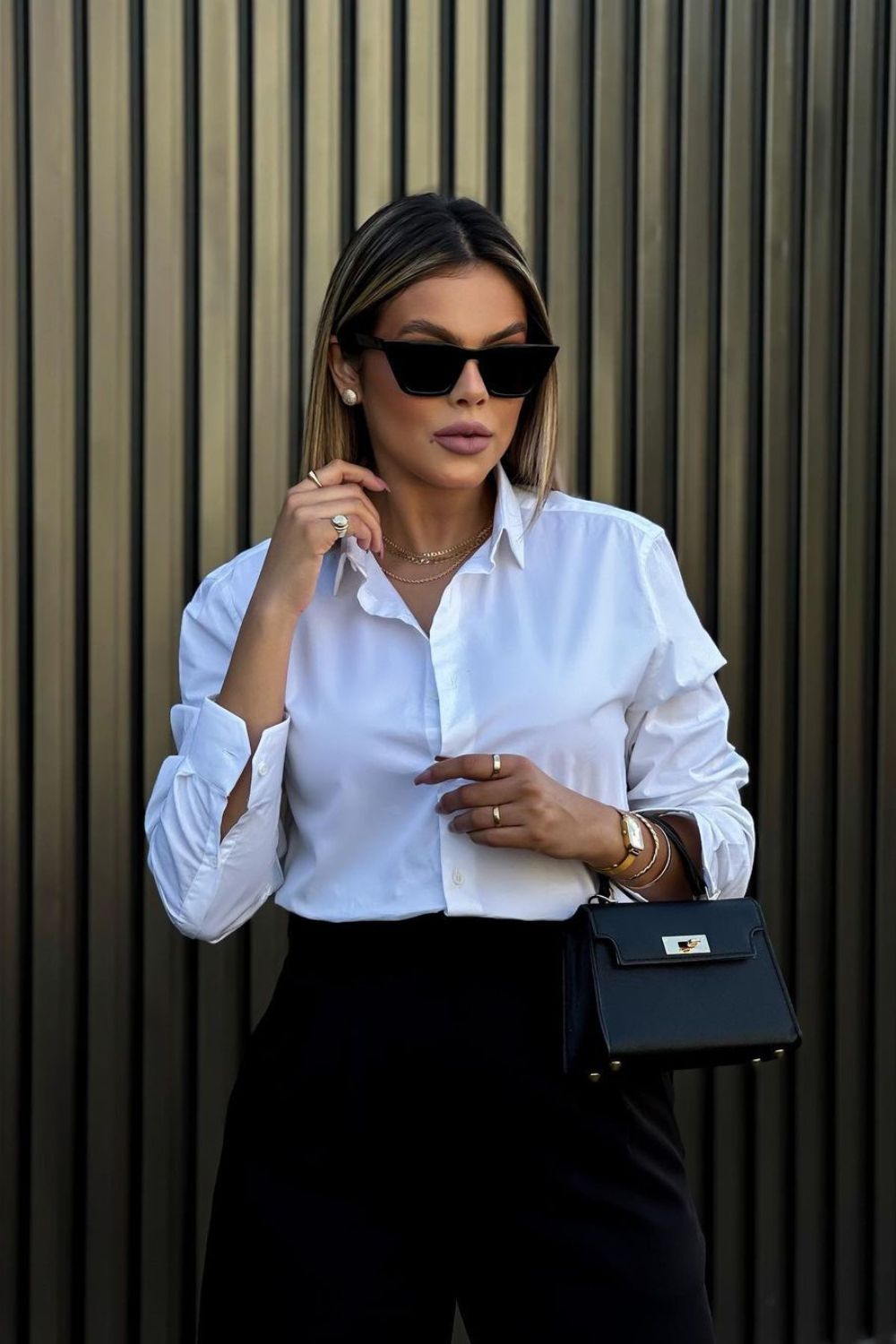 Elegant woman with gold jewelry