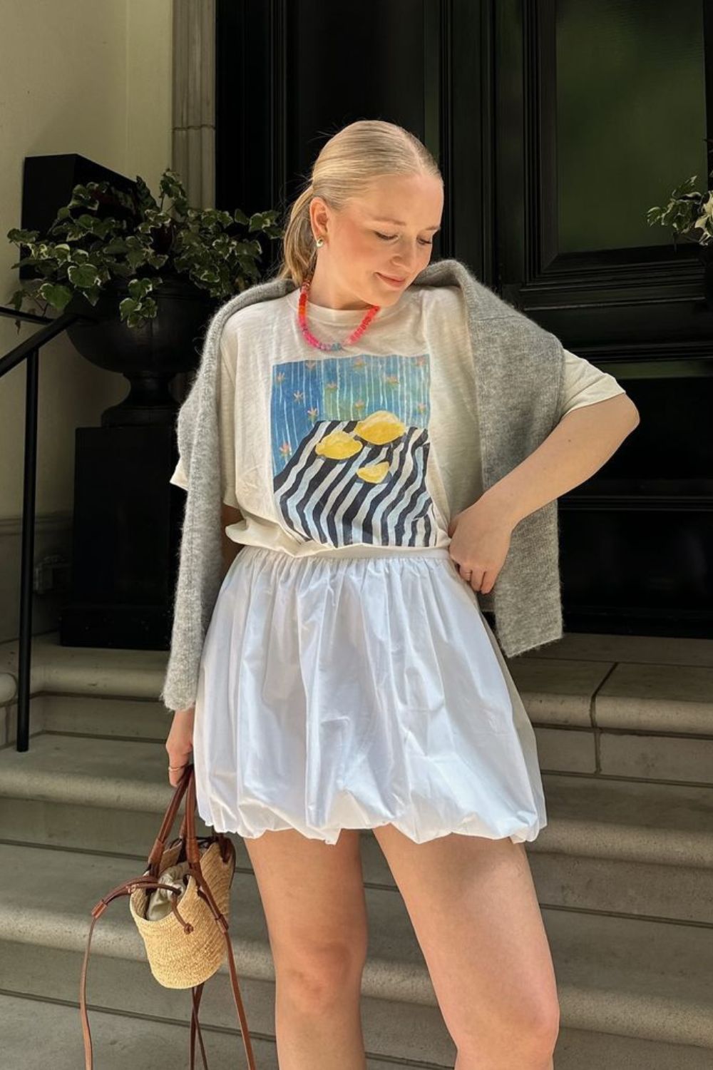 Graphic Tee and White Skirt