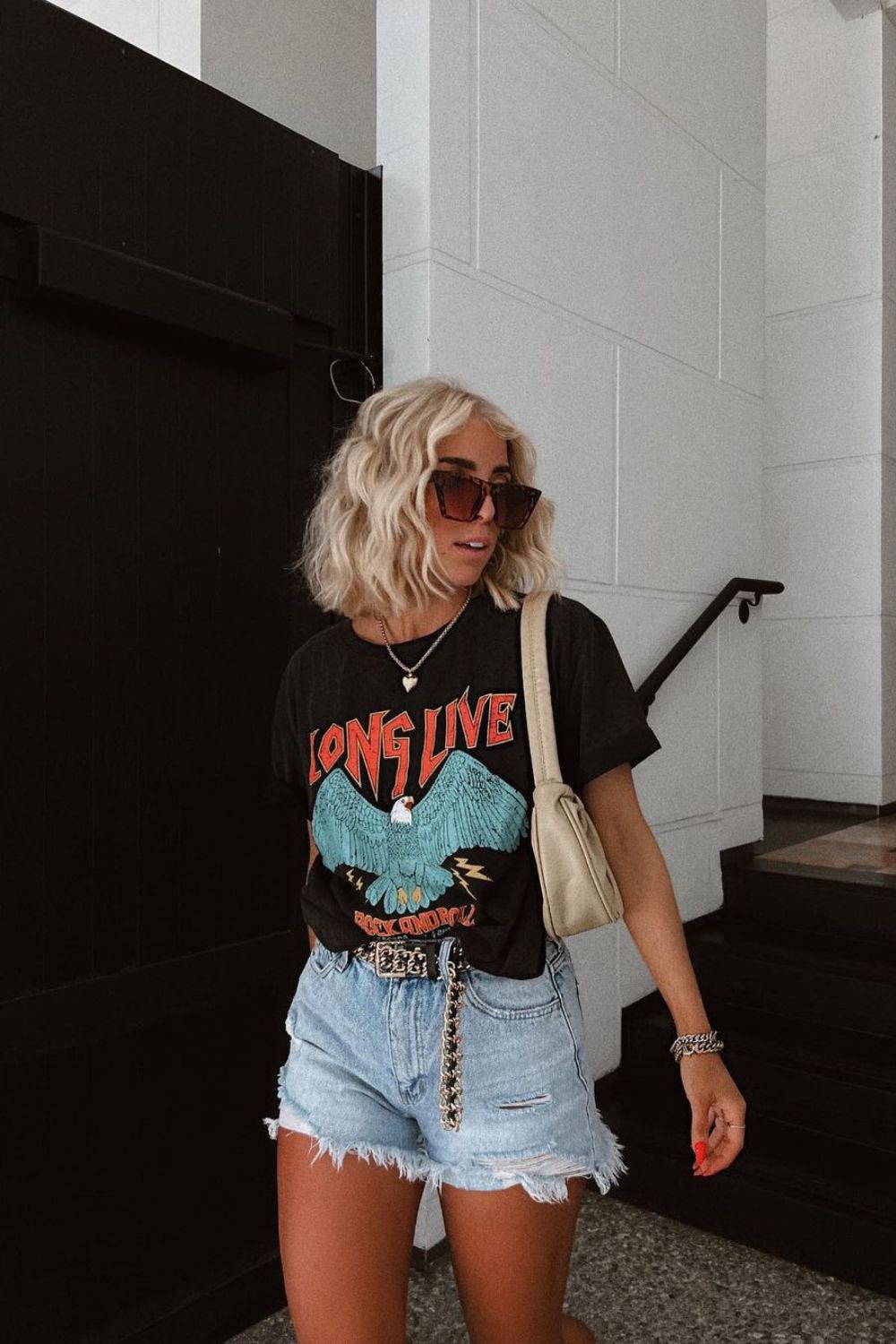 Graphic tee and distressed shorts