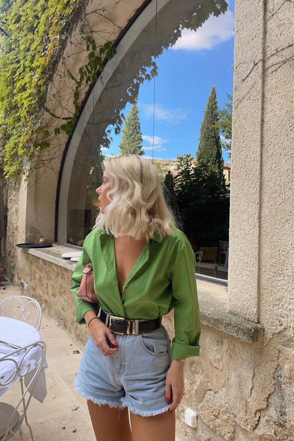 Green shirt and high-waisted shorts