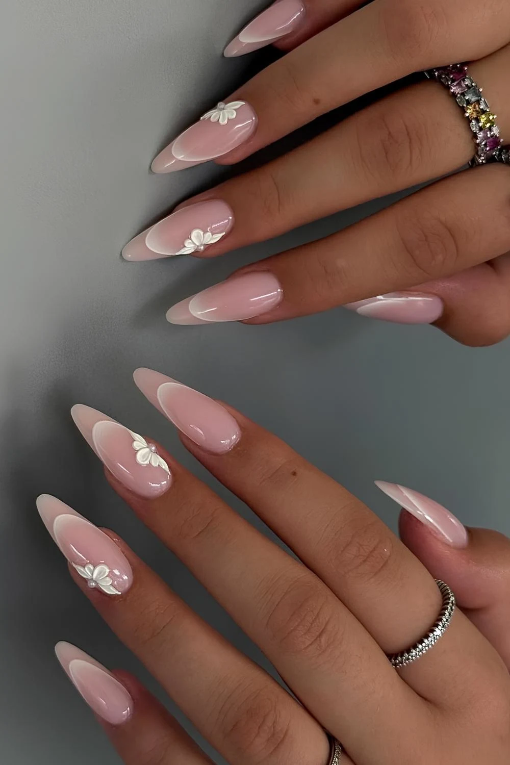 Invisible French manicure with half floral accents