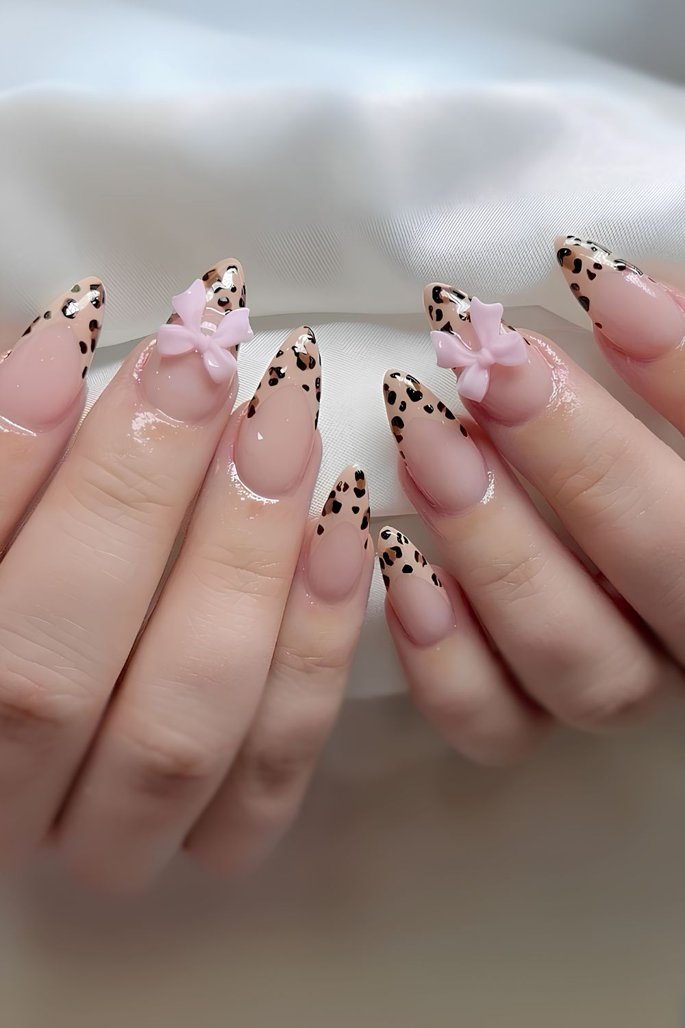 Leopard French nails with pink bows