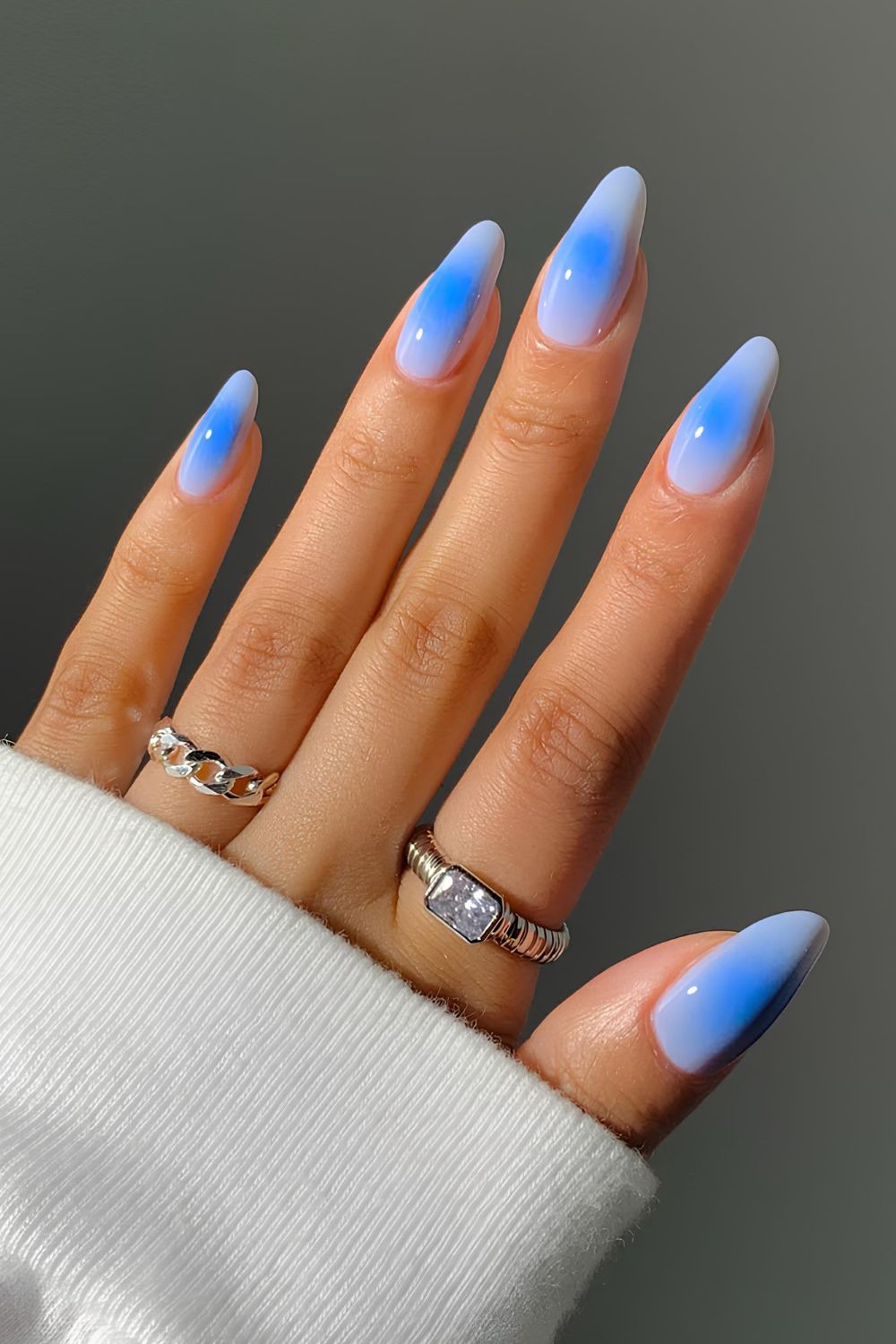 Light blue aura-effect nails