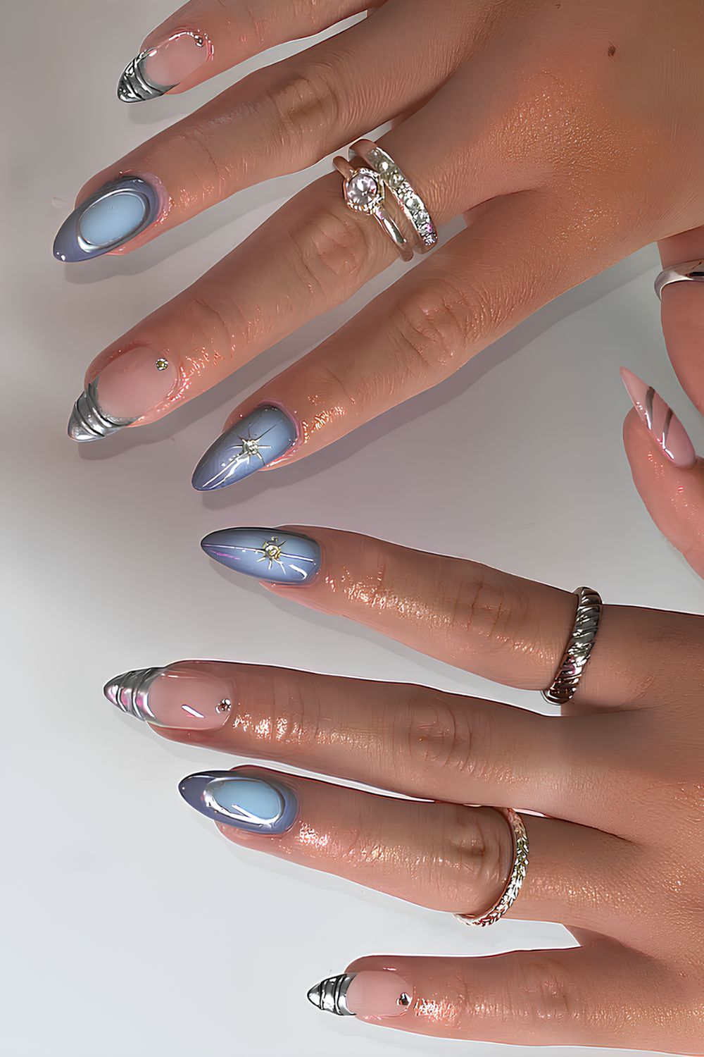 Light blue aura mani with silver chrome accents