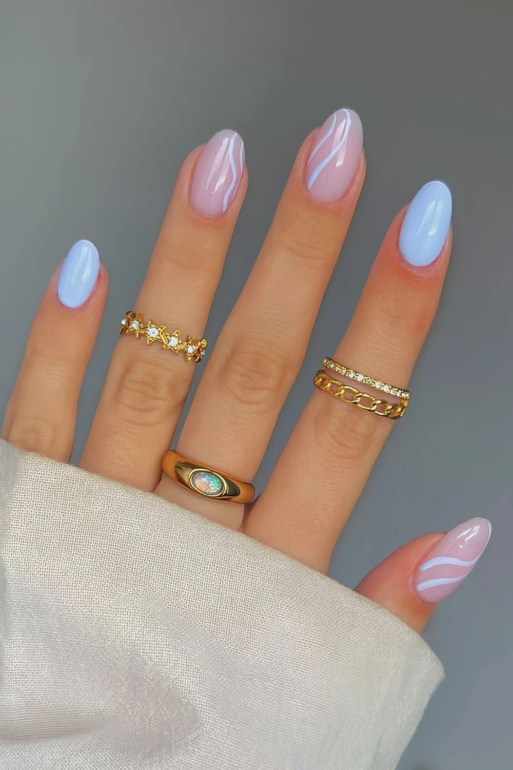 Light blue mani with accent line art