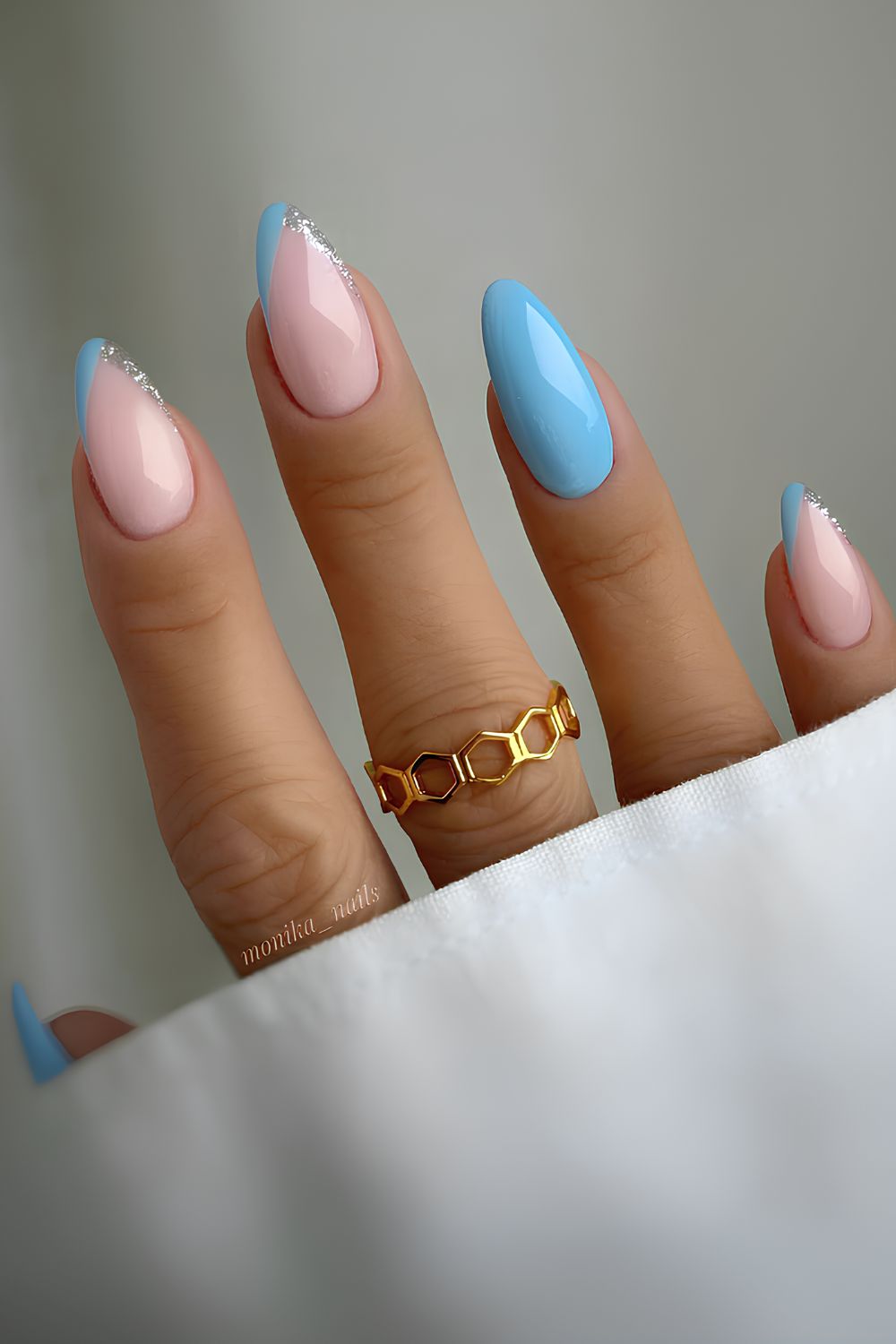 Light blue mani with pointed French tip accents