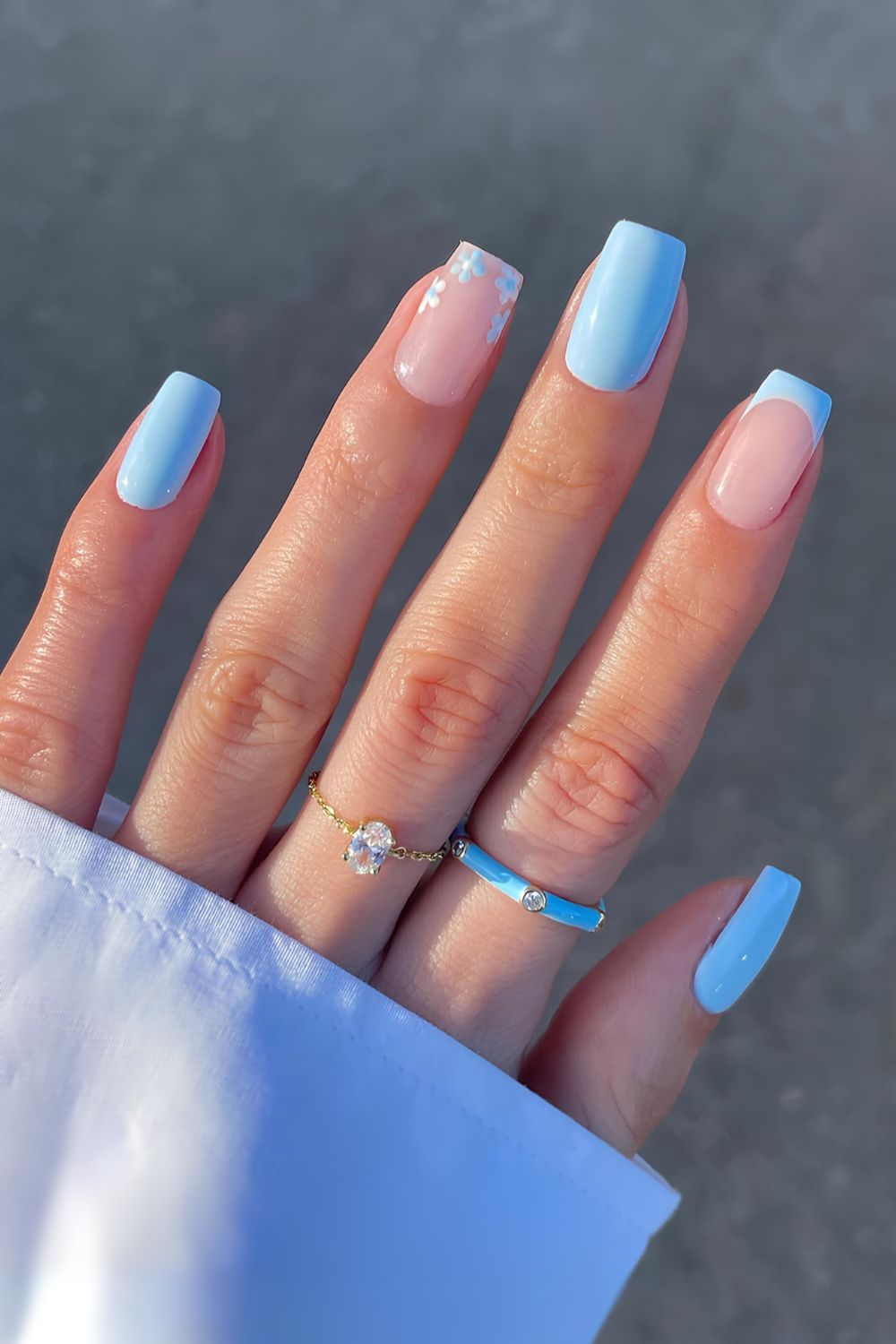 Light blue nails with floral art