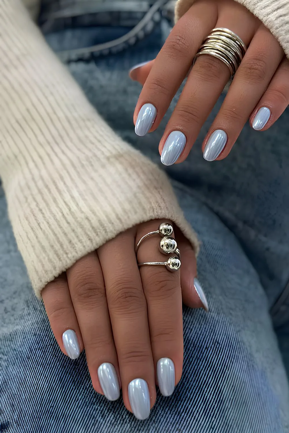 Light blue pearly chrome nails