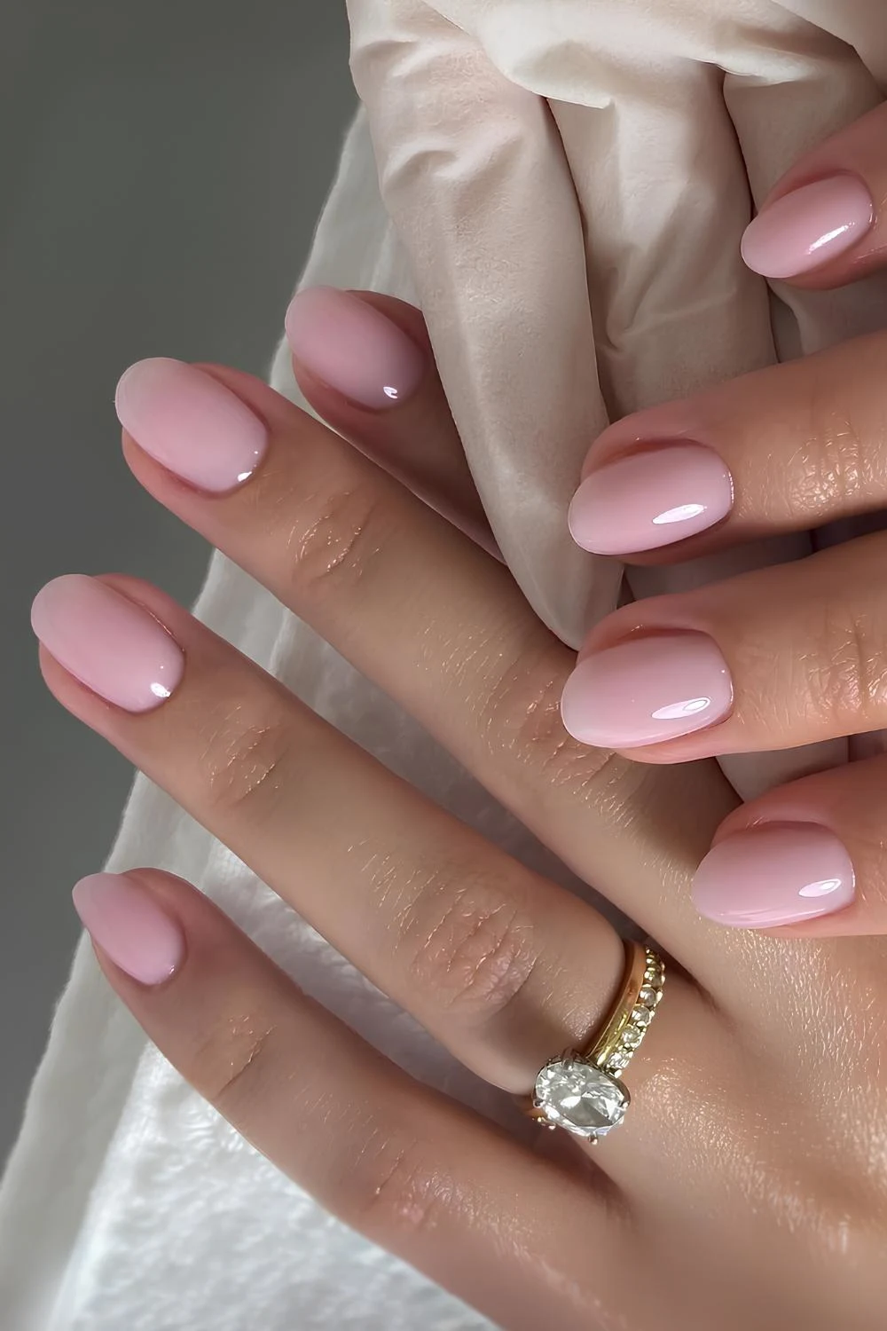 Light pink nails with subtle ombre accent