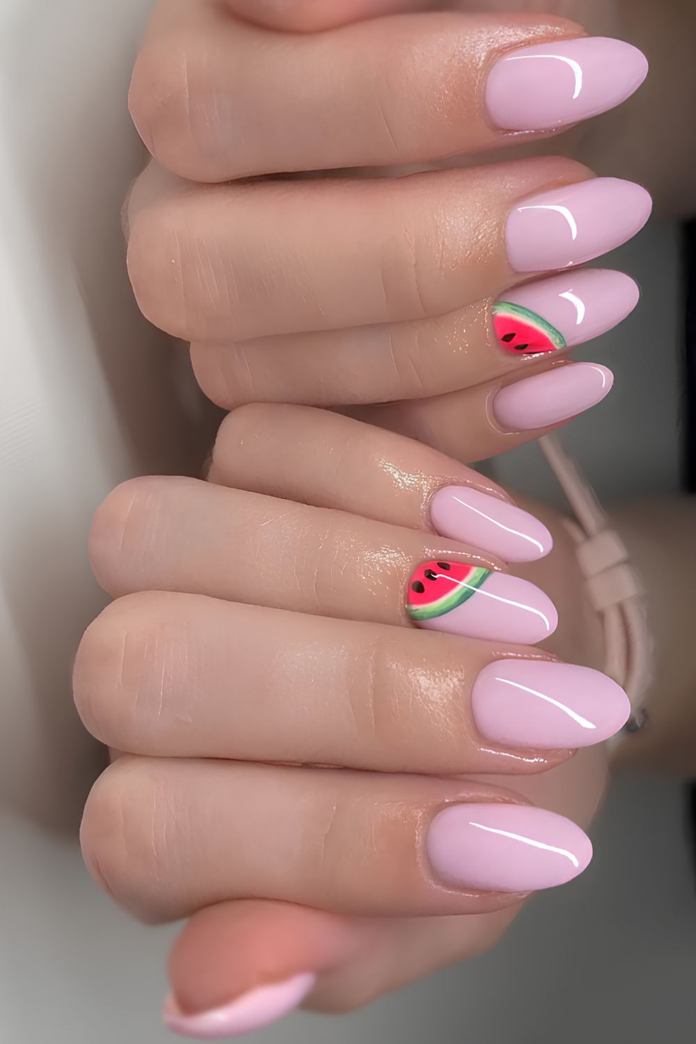 Light pink nails with watermelon accents