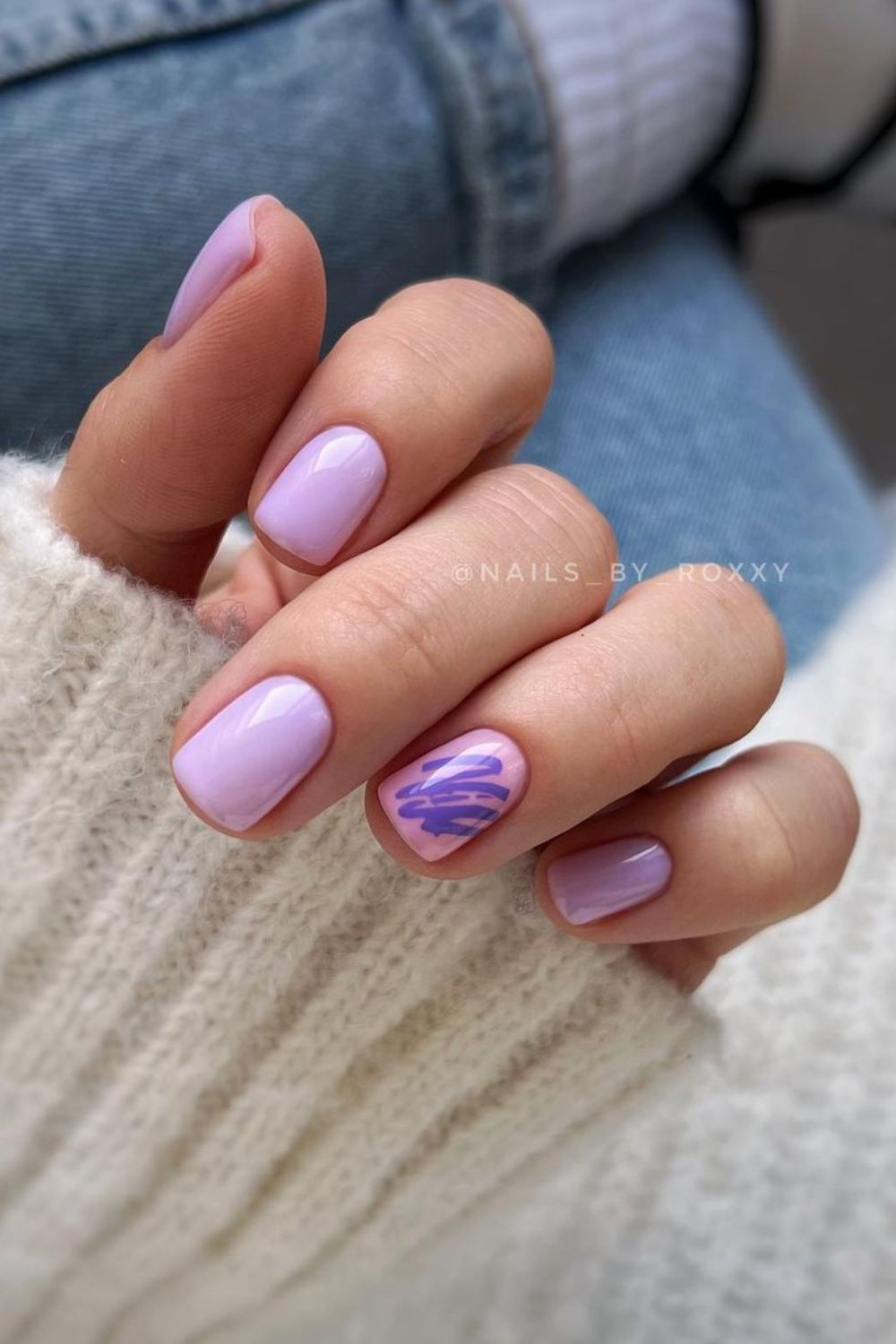 Lilac nails with purple brushstrokes