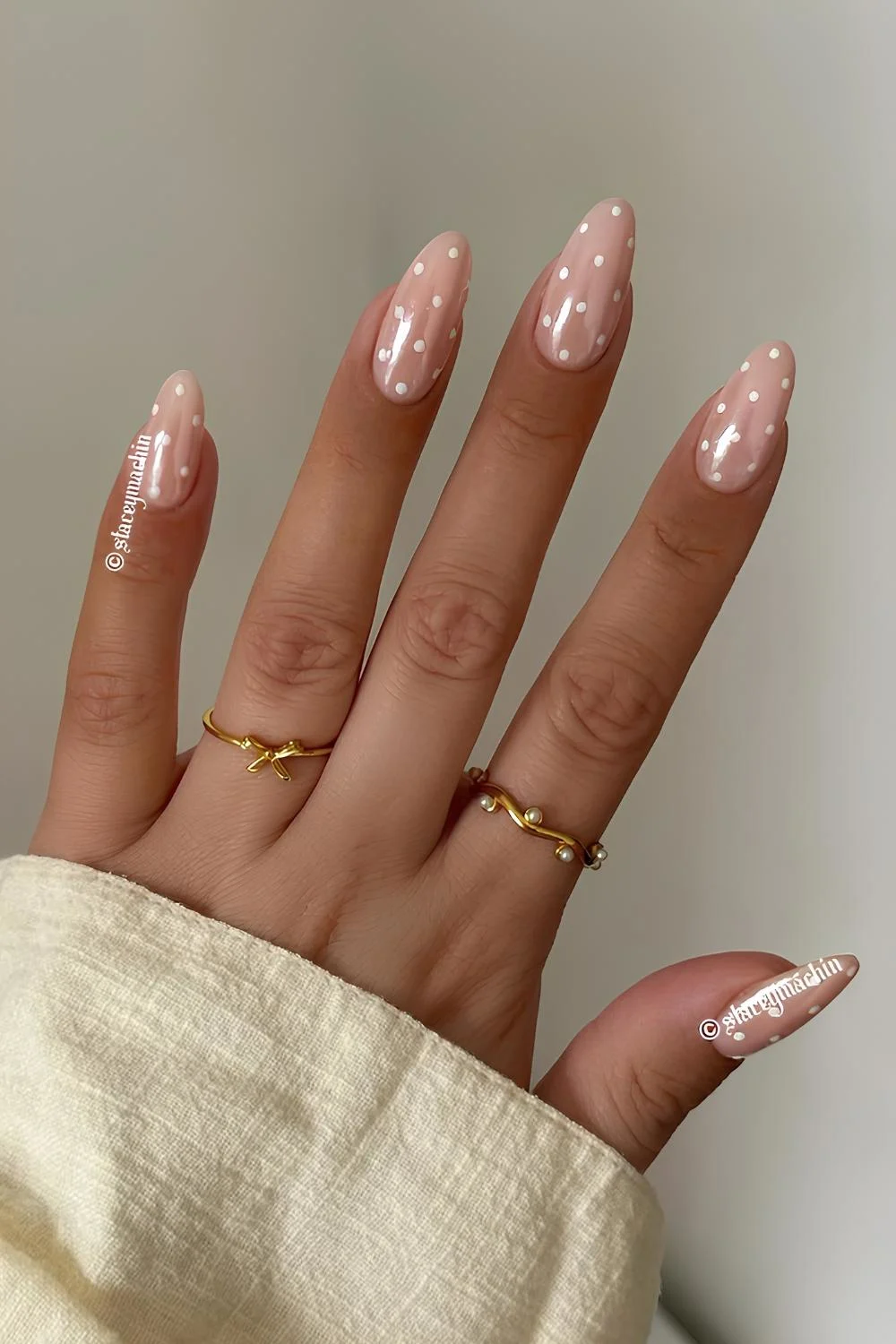 Milky chrome nails with polka dot art