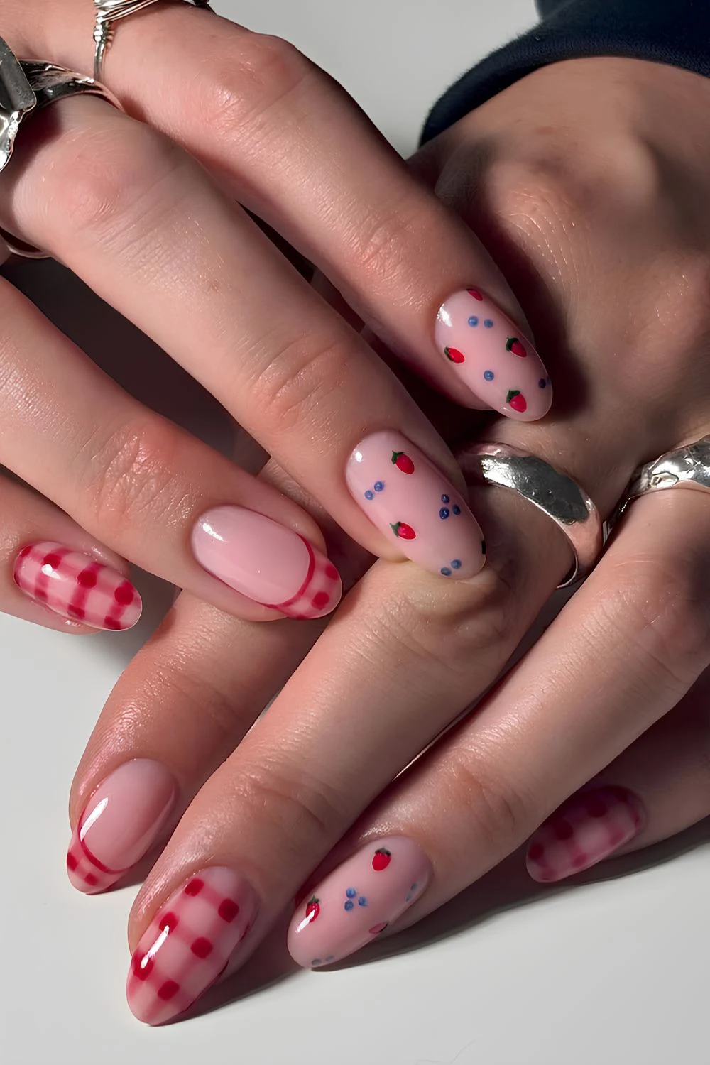 Milky nails with strawberry and gingham art