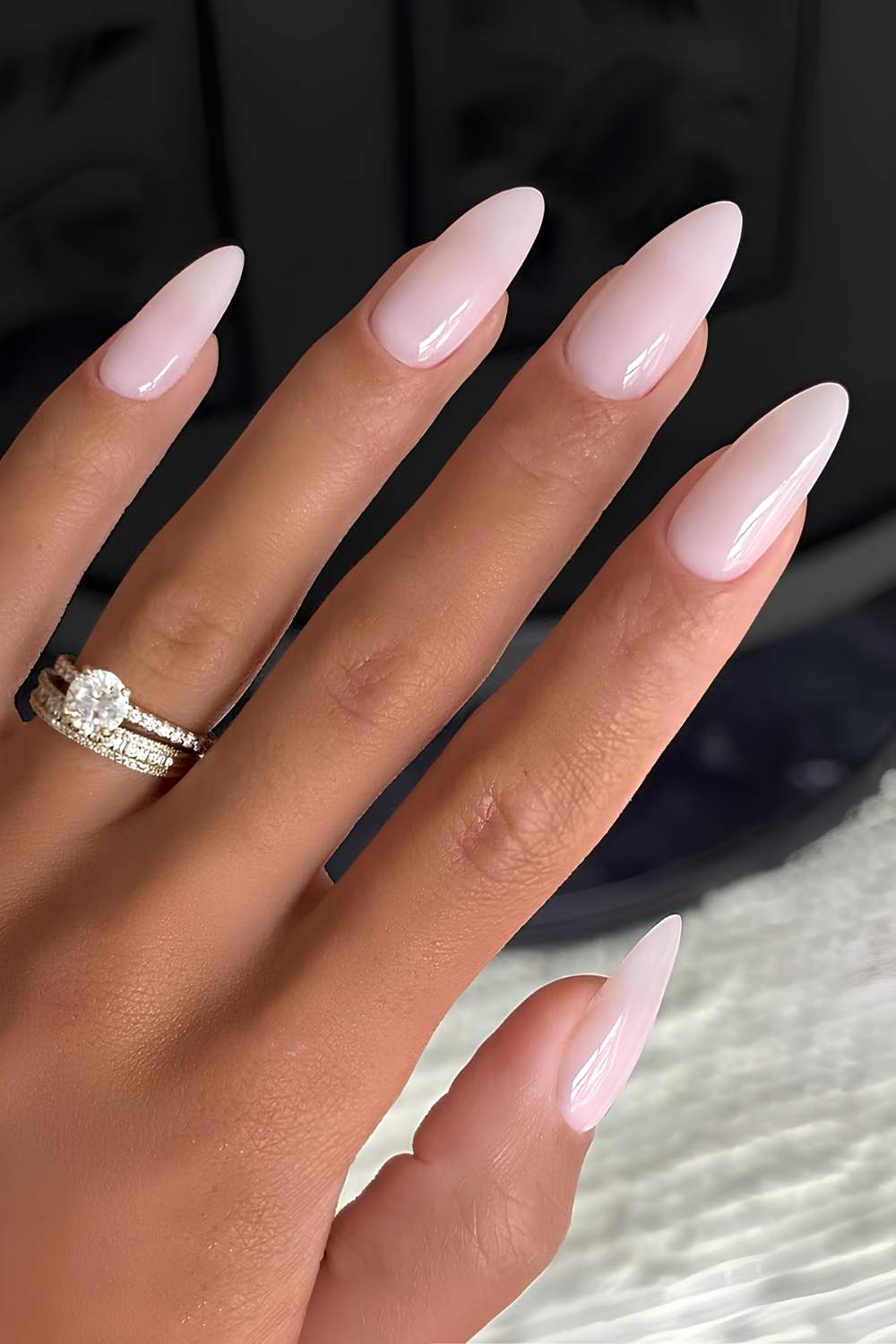 Milky pink almond shaped manicure