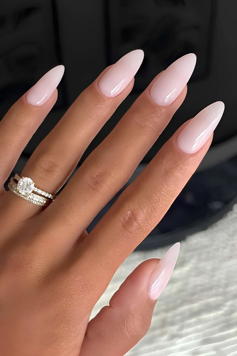 Milky pink almond shaped manicure