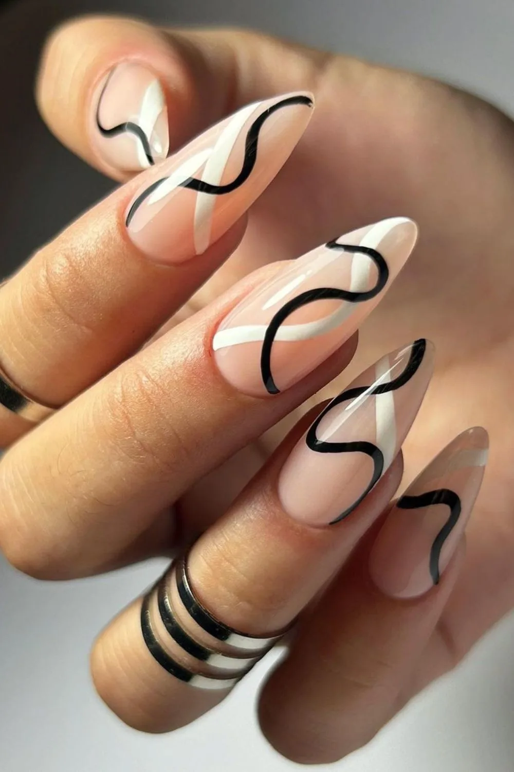 Nails with black and white swirls