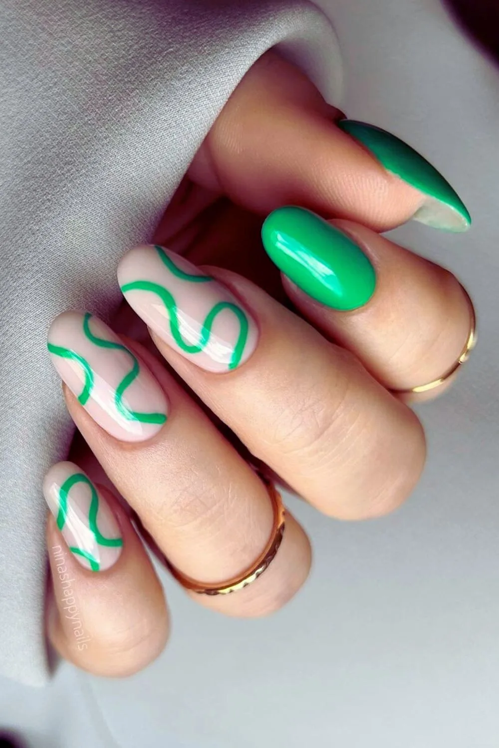 Nails with green swirls