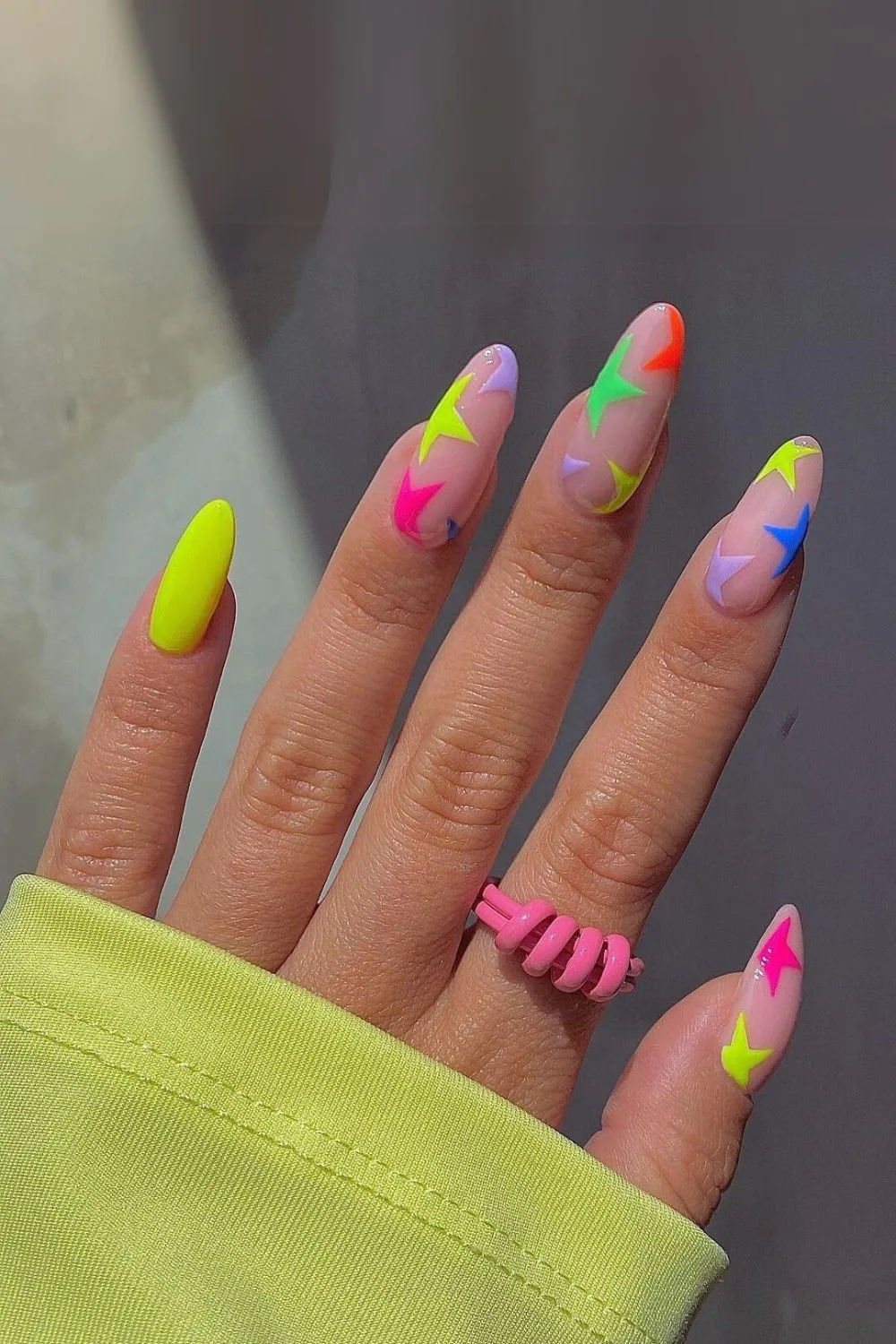 Nails with neon star accents