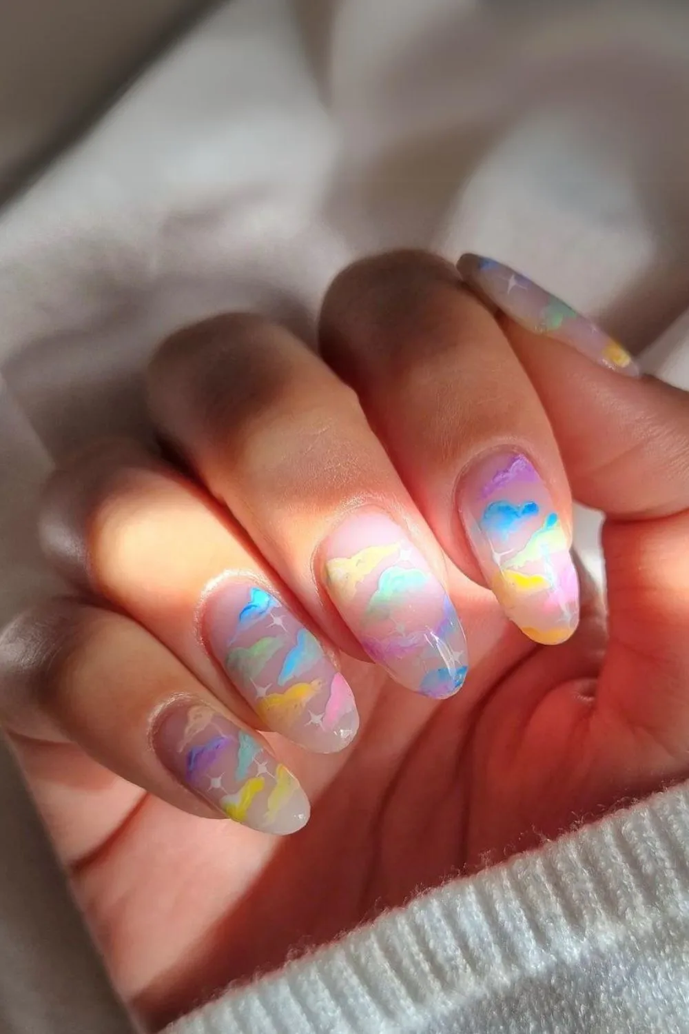 Nails with pastel clouds