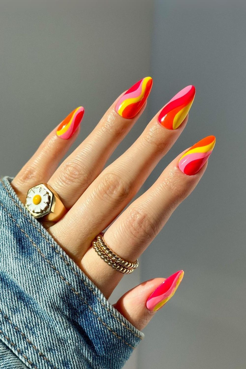 Neon nails with sunset colored swirls