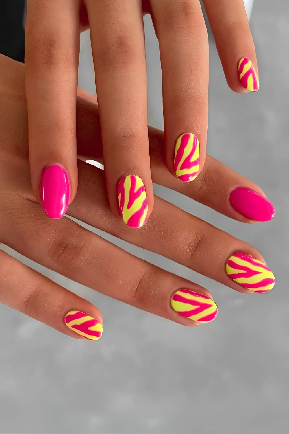 Neon pink mani with zebra print