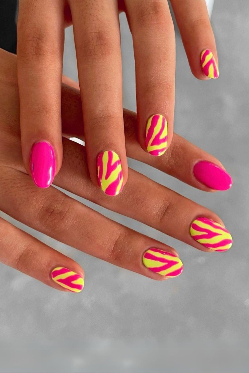 Neon yellow and pink zebra nails