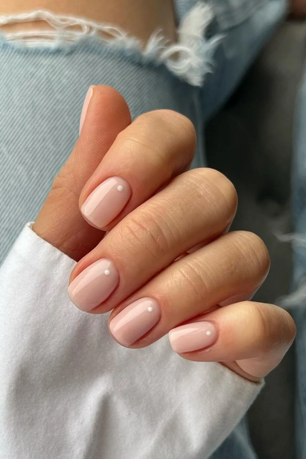 Nude nails with a dot