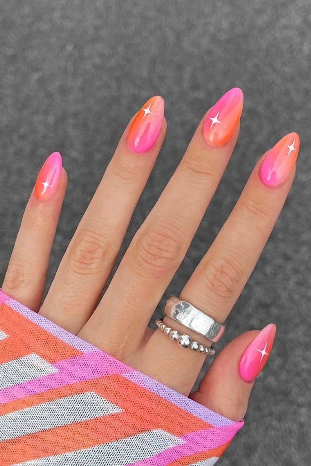 Orange and pink aura nails