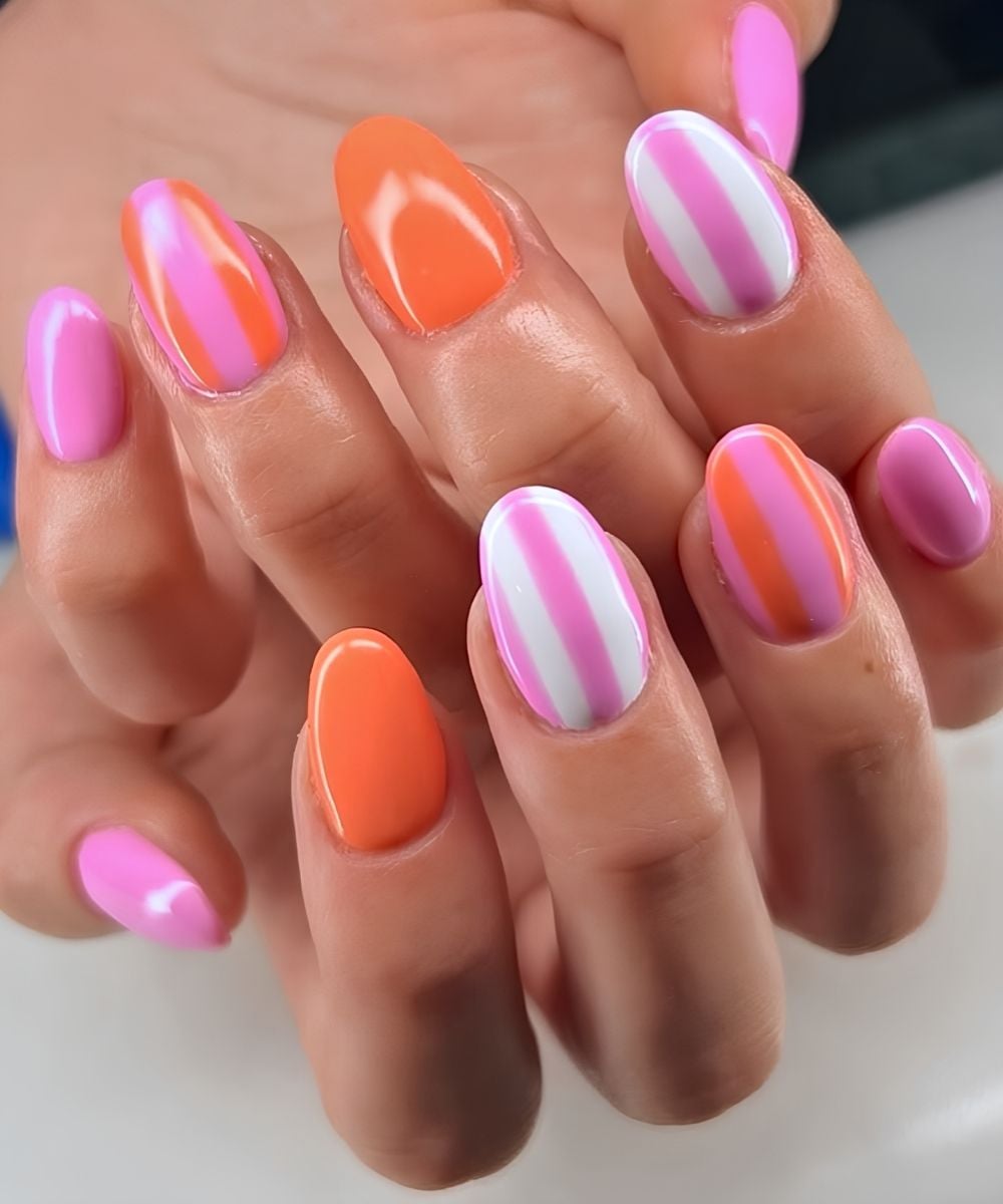 Orange and pink striped nails