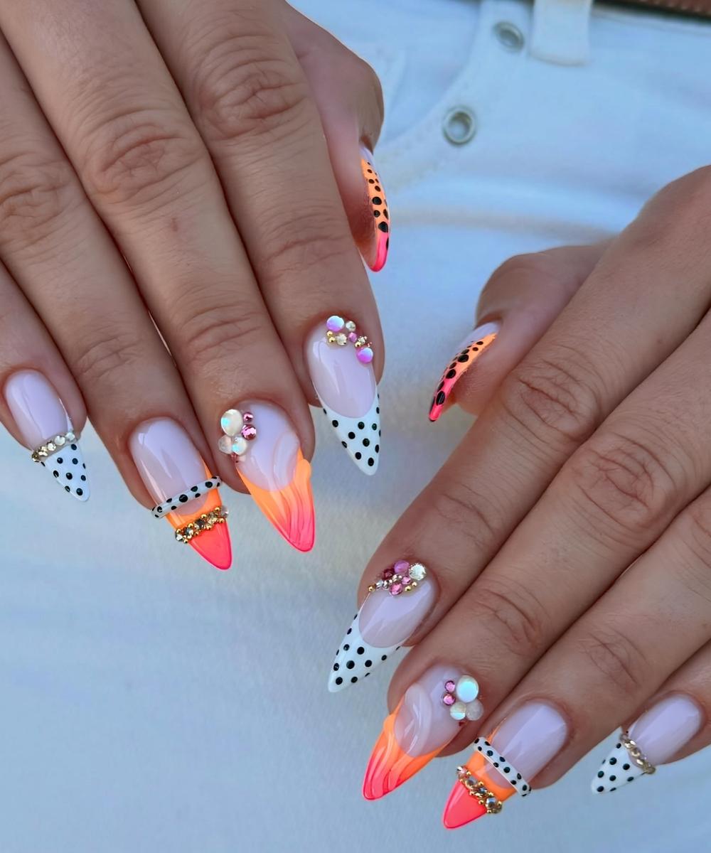Orange and white mani with bangle art