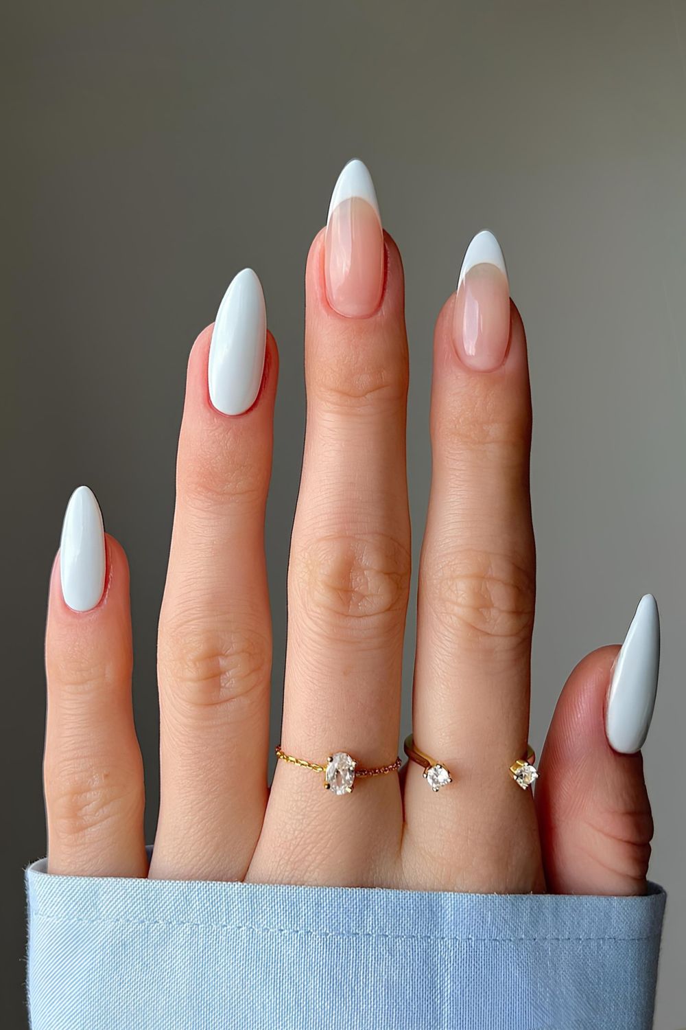 Pale blue nails with accetn French tips