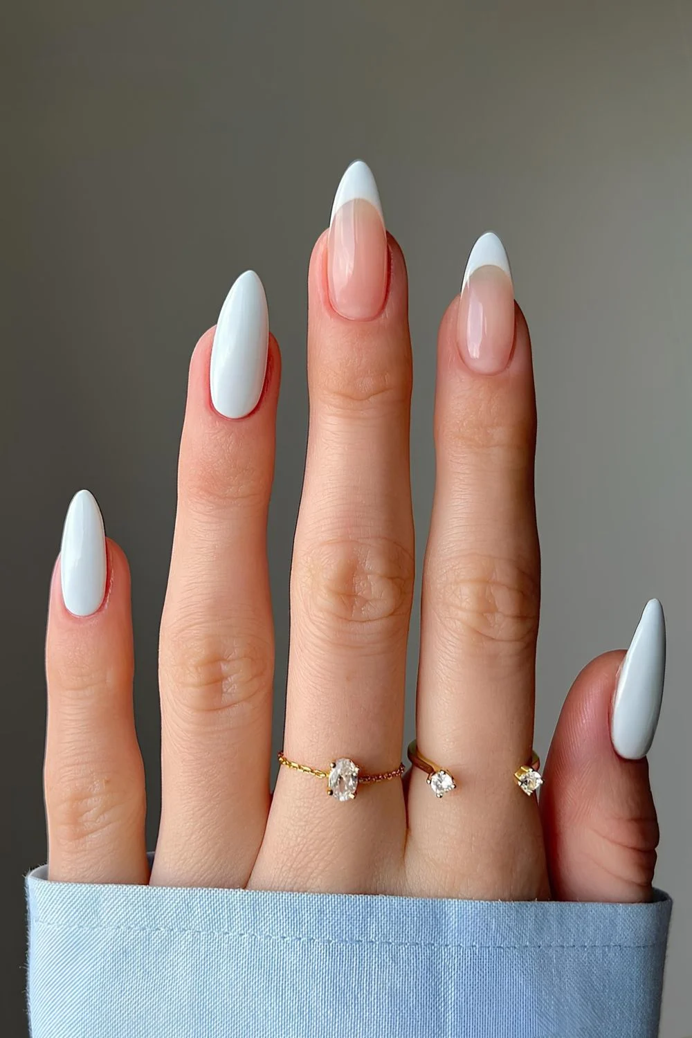 Pale blue nails with accetn French tips