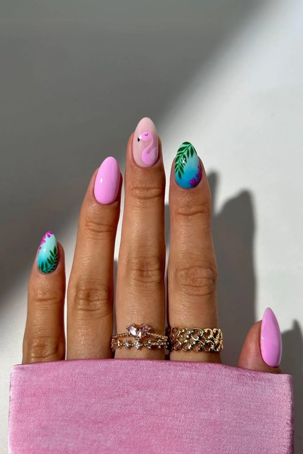 Pink and blue tropical nails