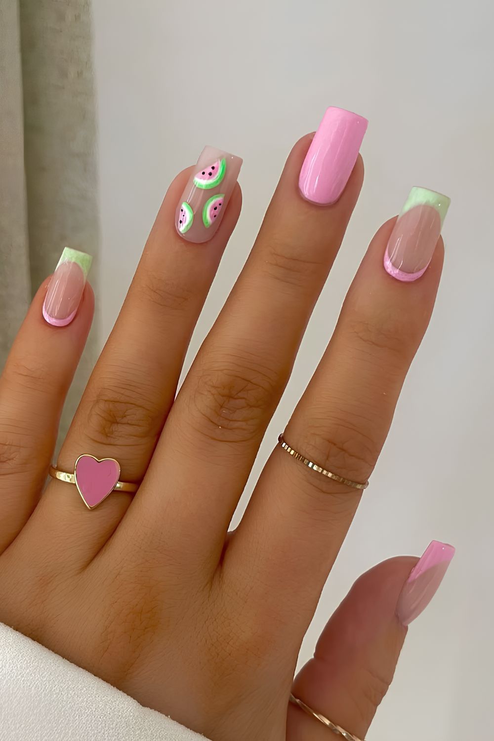 Pink and green nails with watermelon slice art