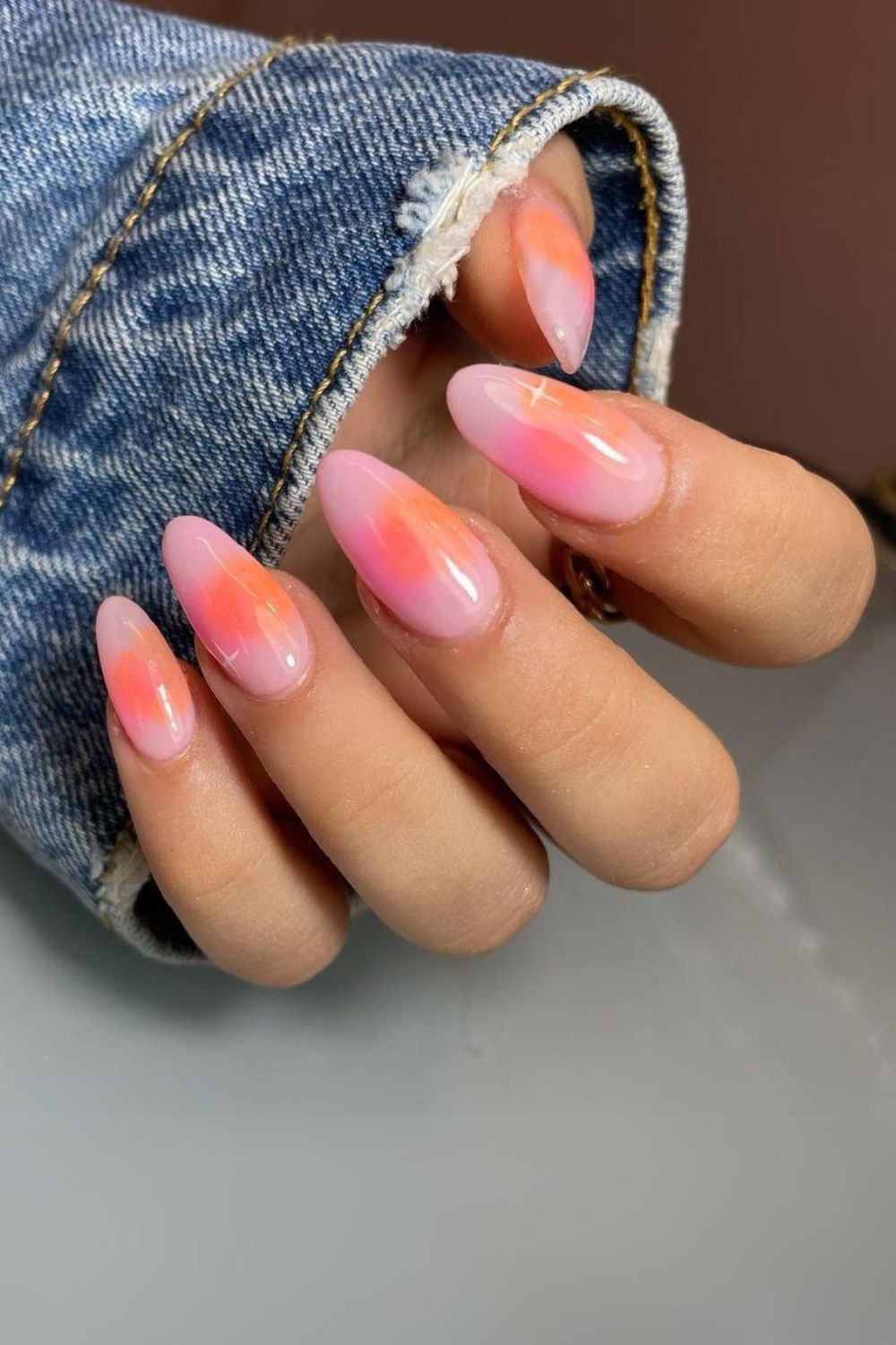 Pink and orange aura nails