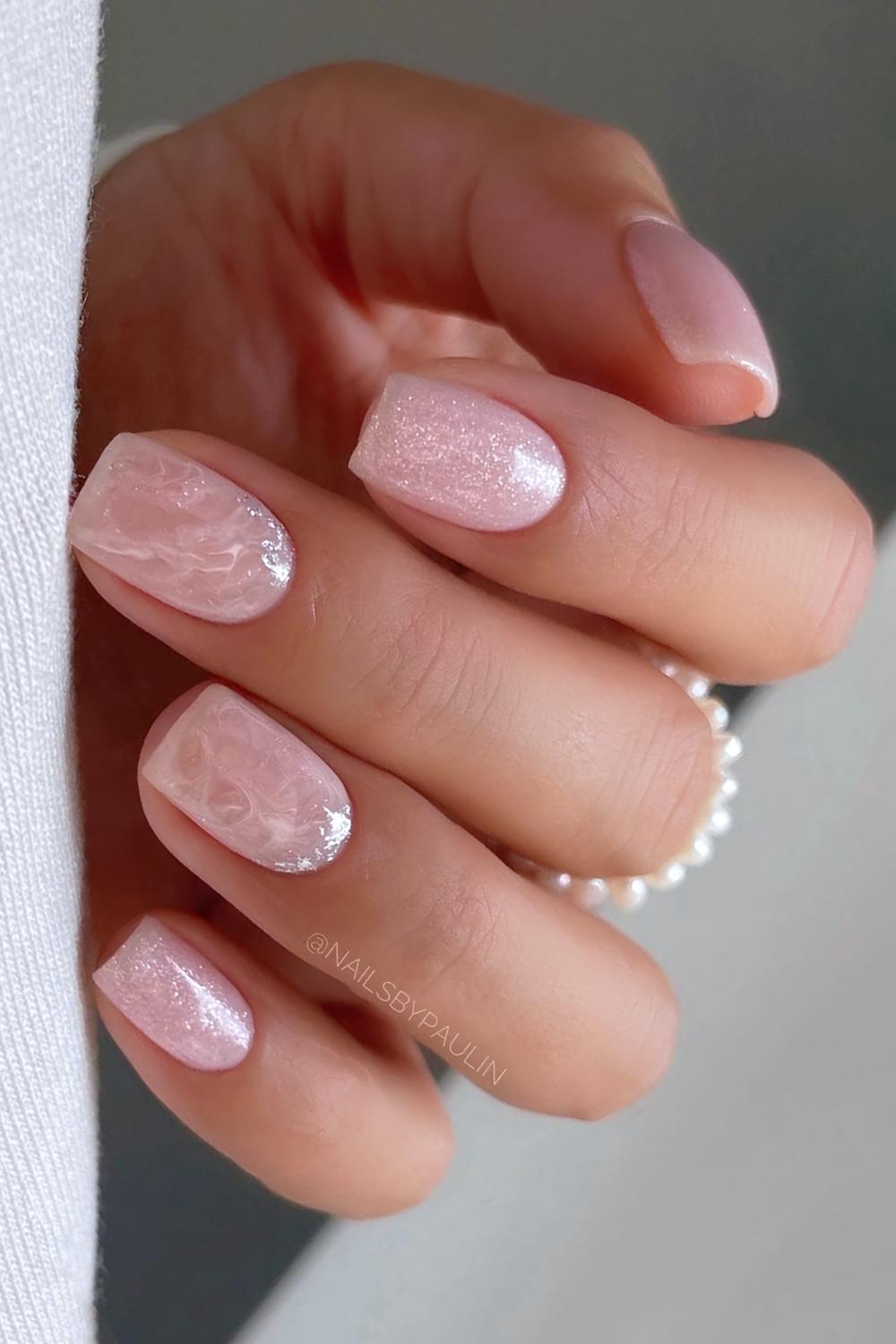 Pink glitter and marble nails combo