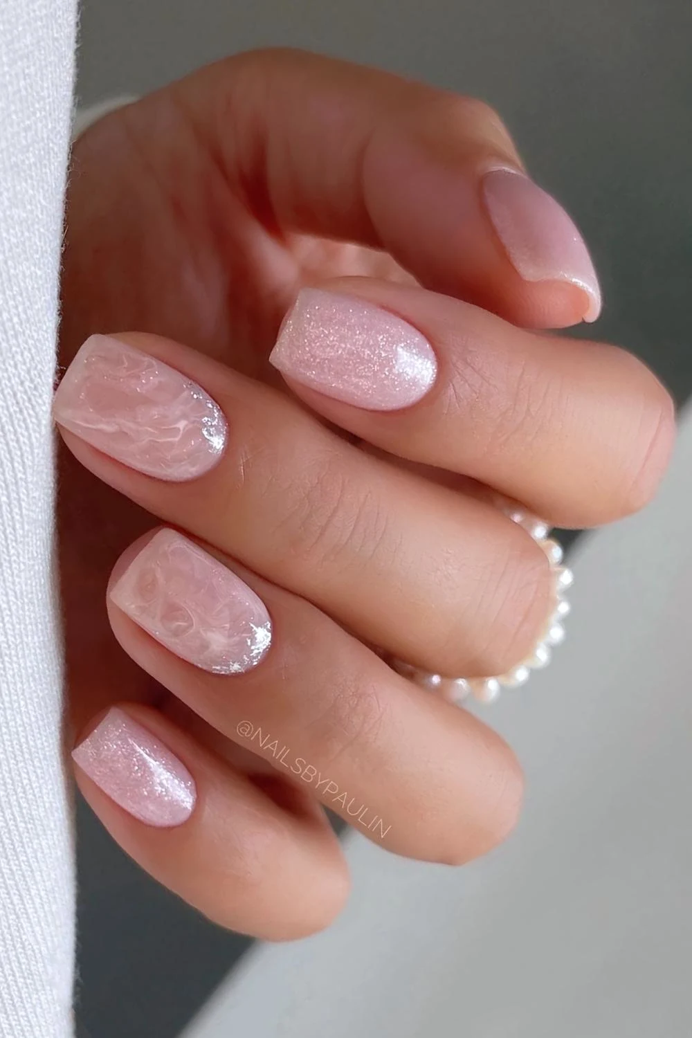 Pink glitter and marble nails combo