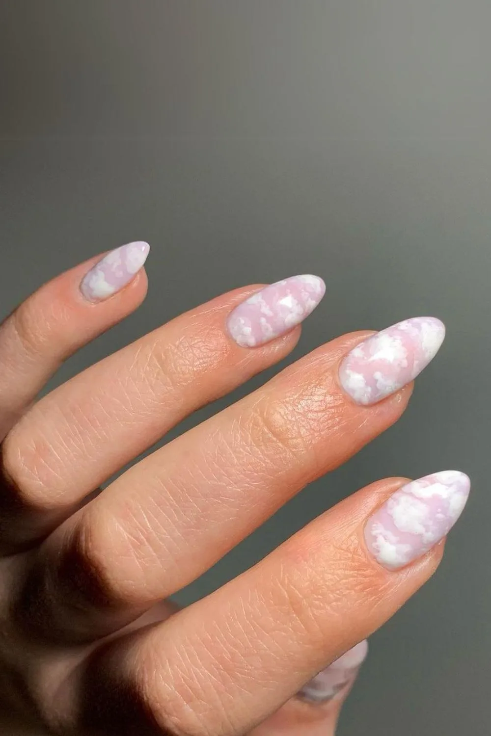 Pink nails with cloud marbling